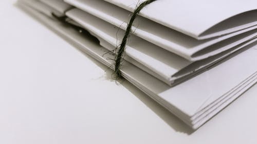 envelopes tied with string